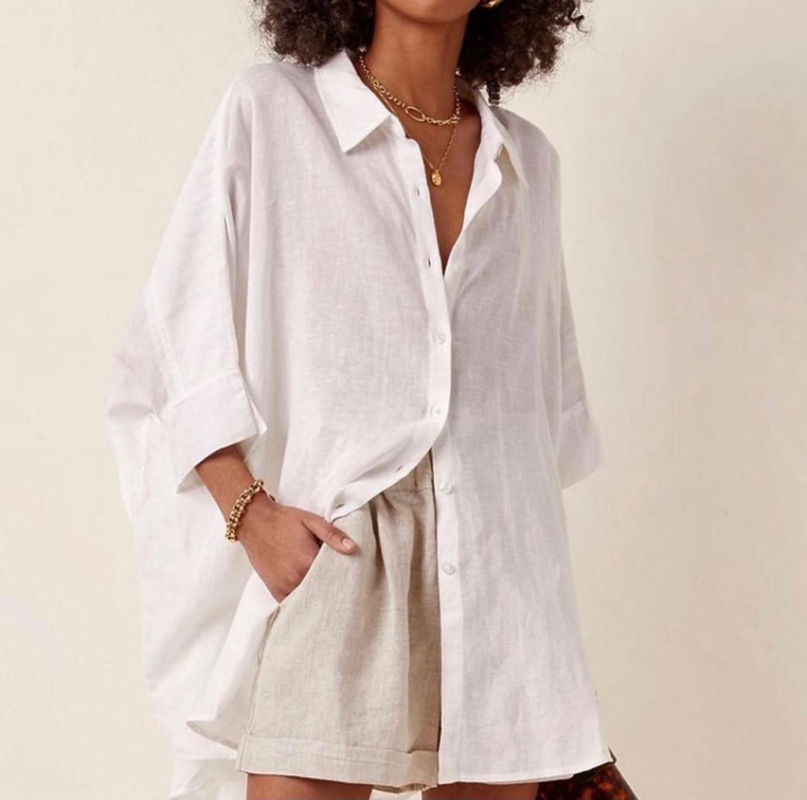 Oversized linen shirt with crop sleeves